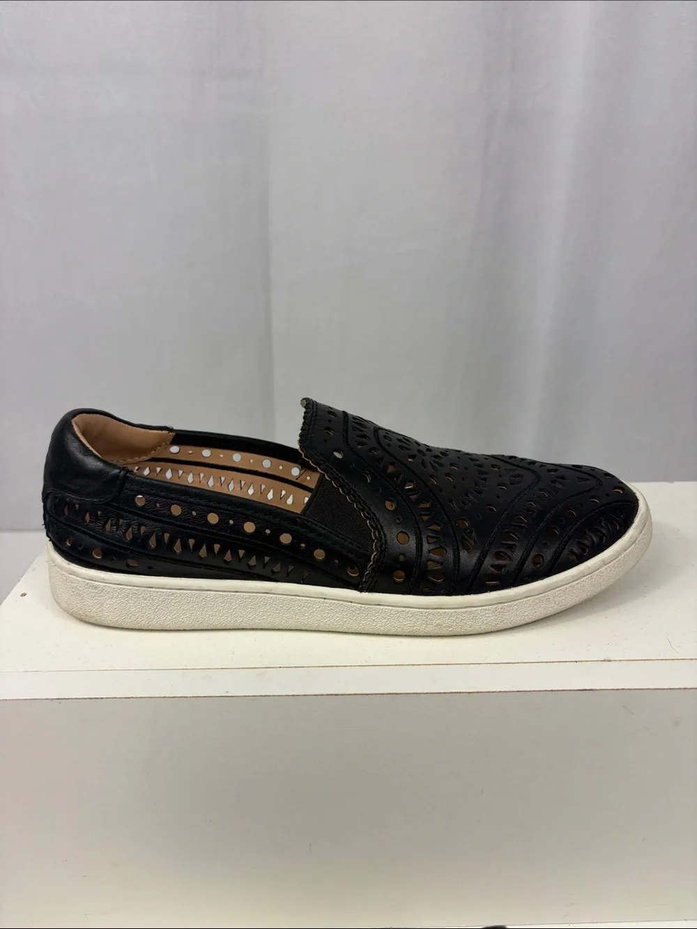 UGG CAS‎ Perforated Slip On Sneaker in Black.